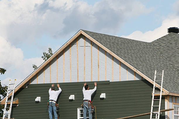 Professional Siding Contractor technician working in Seaford, NY
